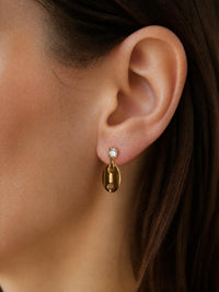 Boucles d’oreilles pendantes dorées en acier inoxydable